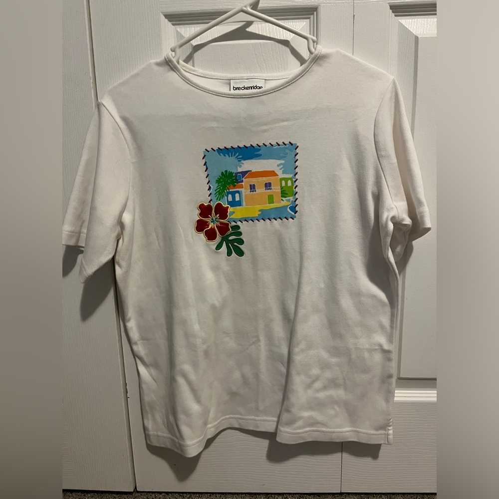 White T-shirt with embroidered flower design